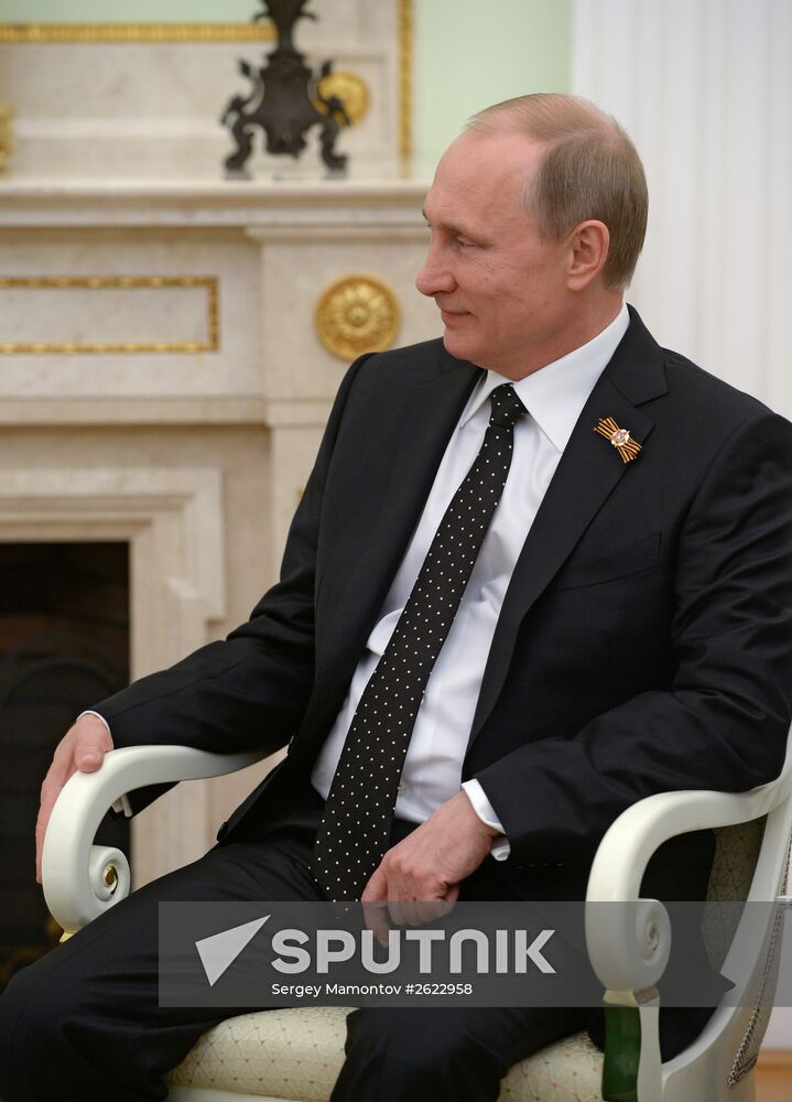 Russian President Vladimir Putin meets with President of Zimbabwe Robert Mugabe