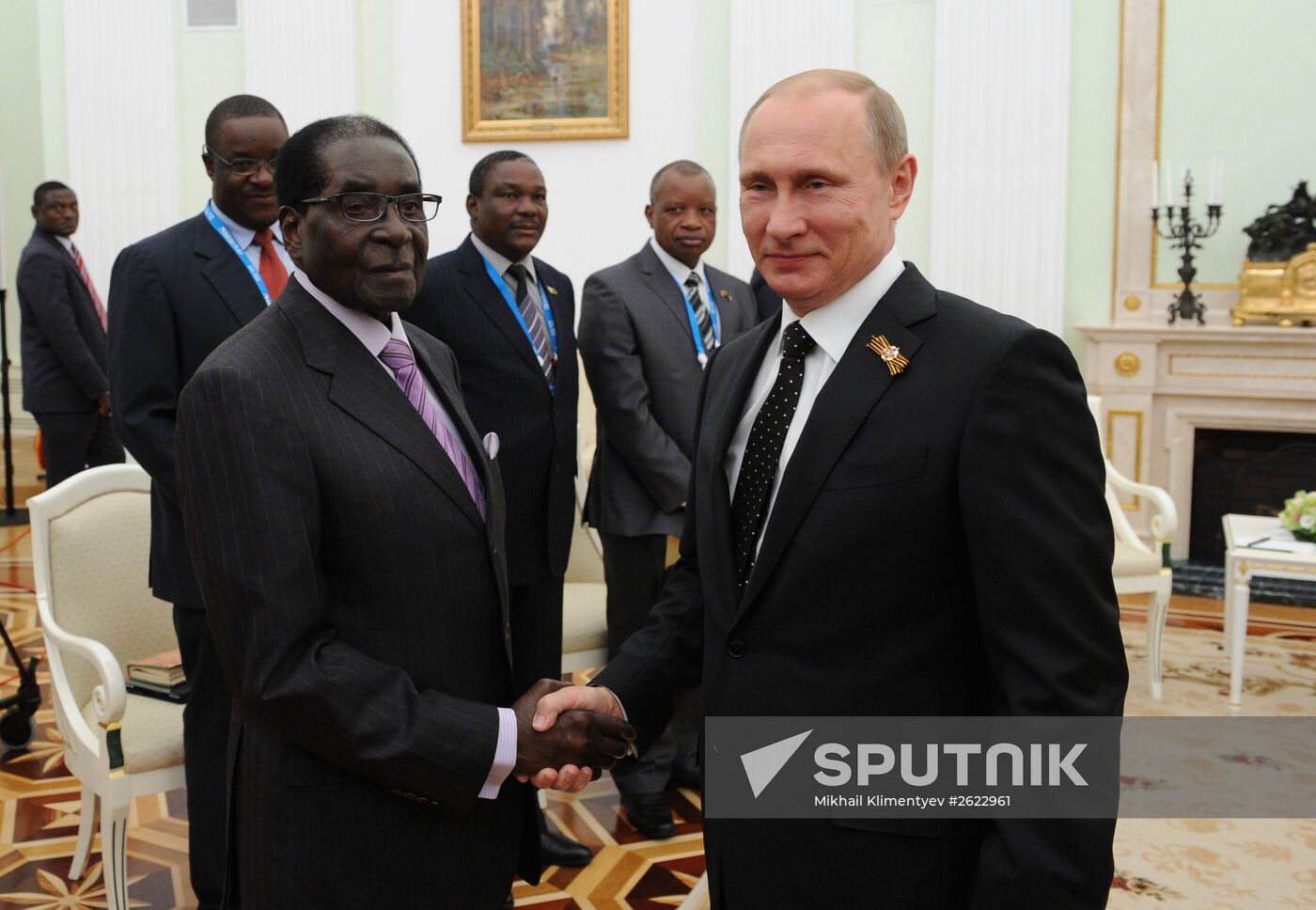 Russian President Vladimir Putin meets with President of Zimbabwe Robert Mugabe