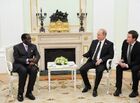 Russian President Vladimir Putin meets with President of Zimbabwe Robert Mugabe