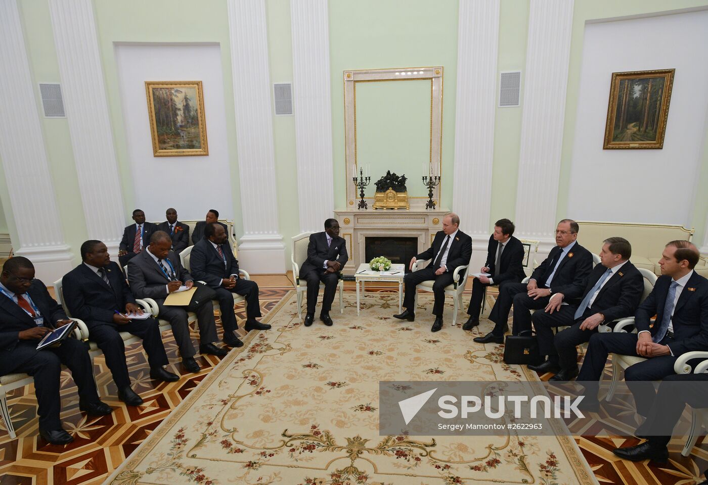 Russian President Vladimir Putin meets with President of Zimbabwe Robert Mugabe