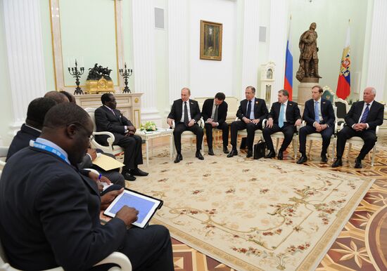 Russian President Vladimir Putin meets with President of Zimbabwe Robert Mugabe