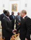 Russian President Vladimir Putin meets with President of Zimbabwe Robert Mugabe