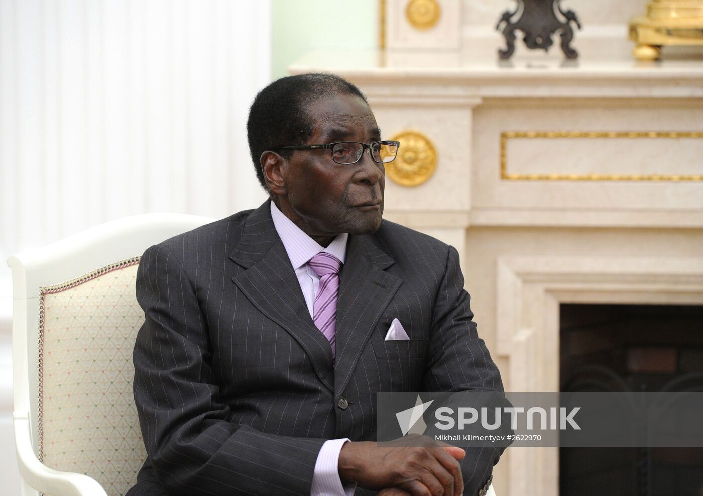 Russian President Vladimir Putin meets with President of Zimbabwe Robert Mugabe
