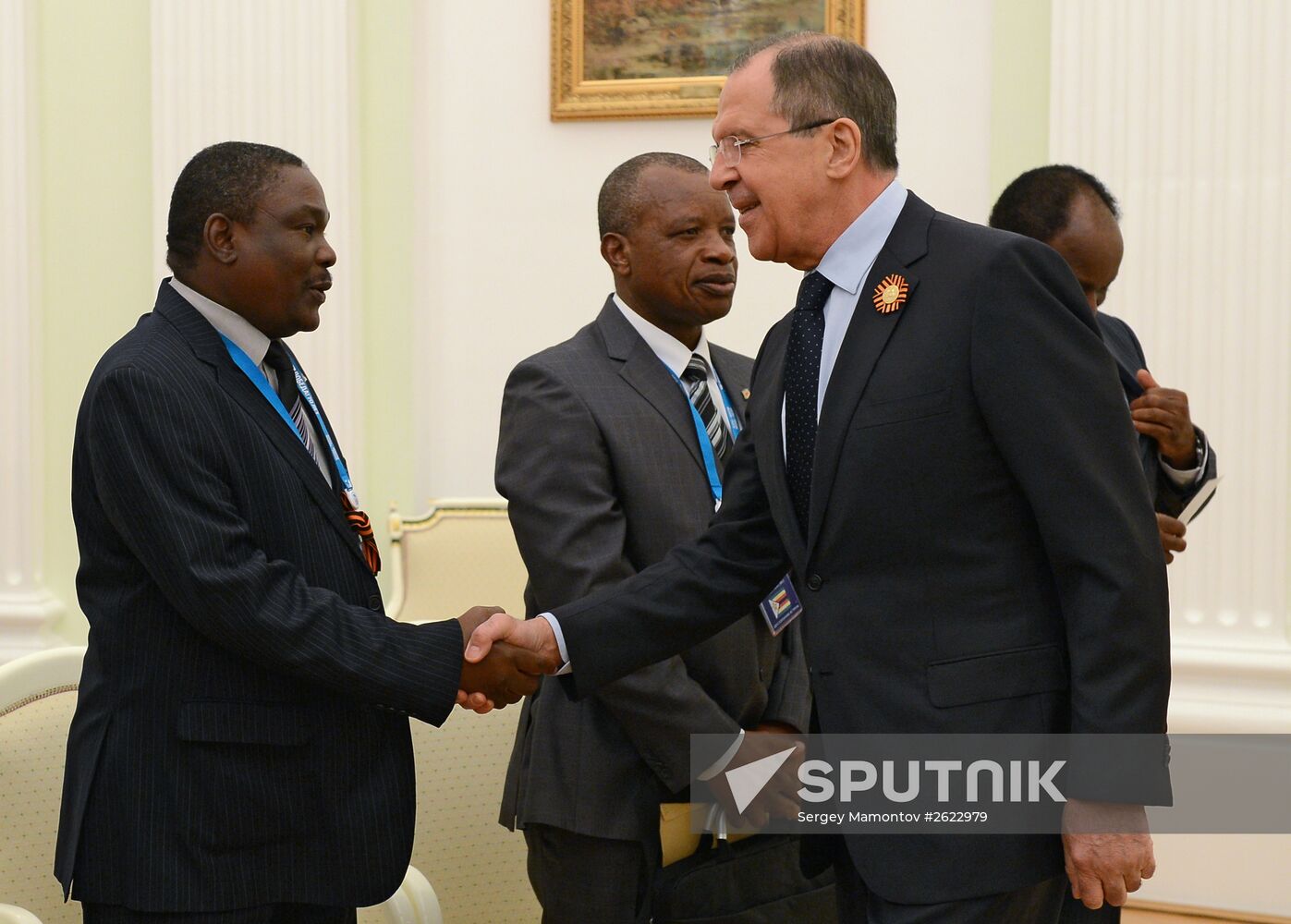 Russian President Vladimir Putin meets with President of Zimbabwe Robert Mugabe