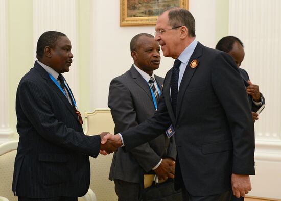 Russian President Vladimir Putin meets with President of Zimbabwe Robert Mugabe