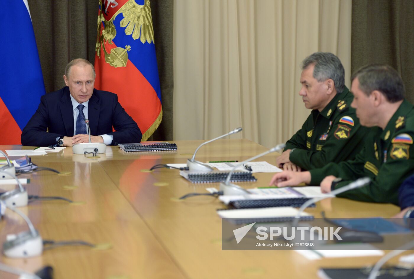 Russian President Vladimir Putin chairs meeting with senior Defense Ministry officials and defense-industry representatives