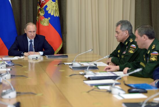 Russian President Vladimir Putin chairs meeting with senior Defense Ministry officials and defense-industry representatives