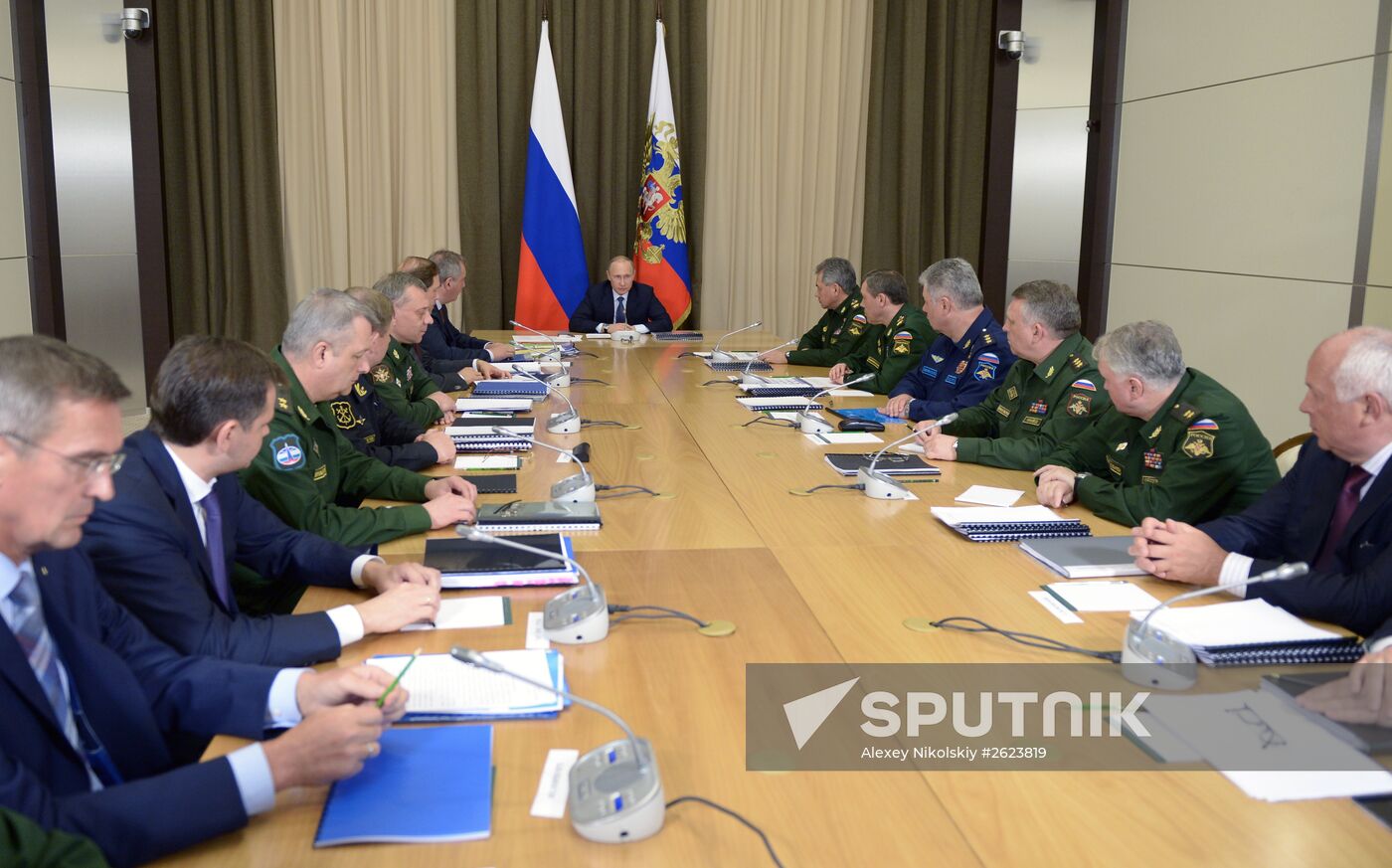 Russian President Vladimir Putin chairs meeting with senior Defense Ministry officials and defense-industry representatives