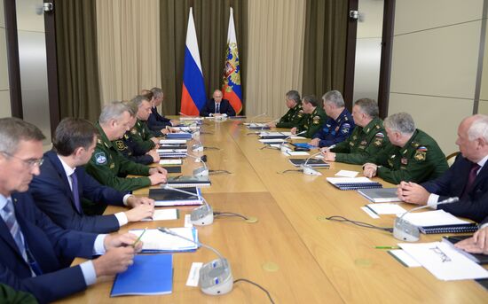 Russian President Vladimir Putin chairs meeting with senior Defense Ministry officials and defense-industry representatives