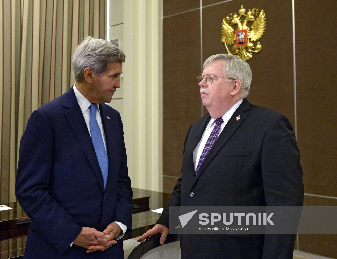 Russian President Vladimir Putin meets with US Secretary of State John Kerry