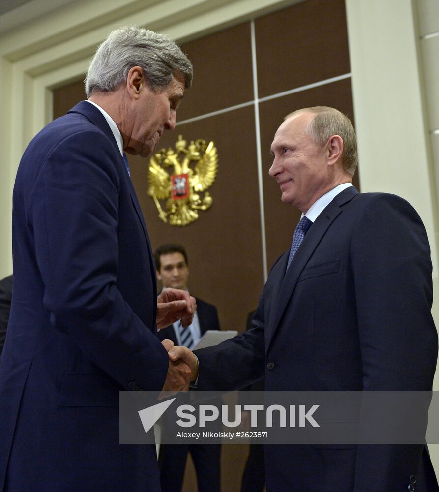 Russian President Vladimir Putin meets with US Secretary of State John Kerry