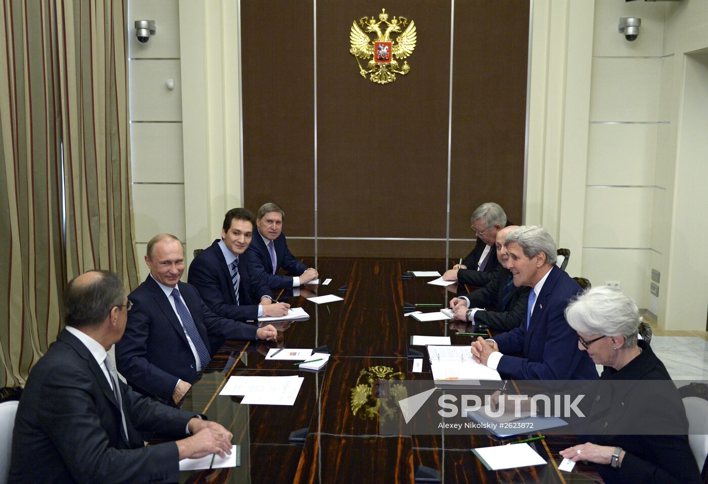 Russian President Vladimir Putin meets with US Secretary of State John Kerry
