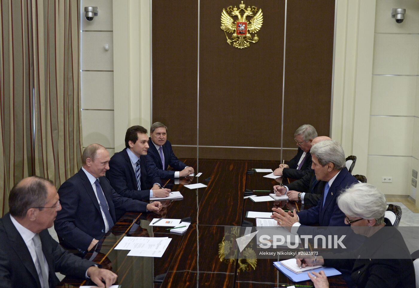 Russian President Vladimir Putin meets with US Secretary of State John Kerry