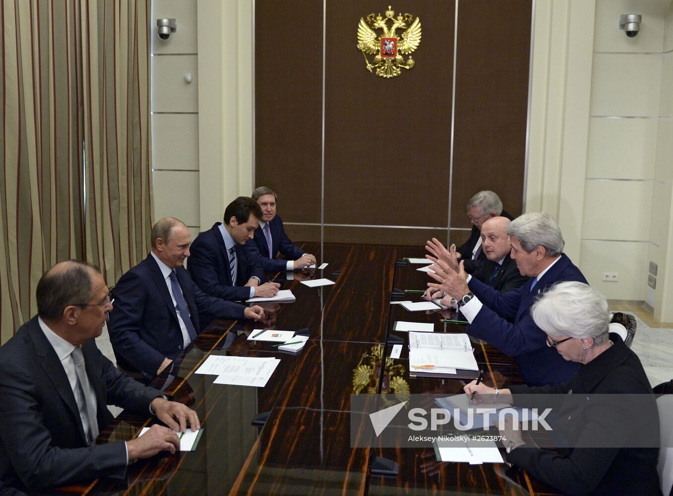 Russian President Vladimir Putin meets with US Secretary of State John Kerry