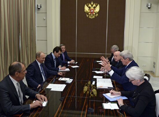 Russian President Vladimir Putin meets with US Secretary of State John Kerry