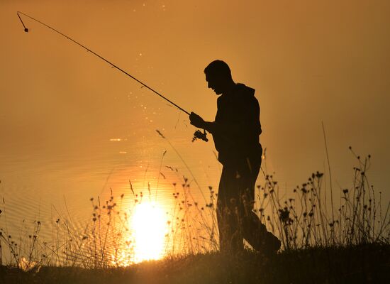 A fisherman on the bank of the Lob River in the Moscow Region