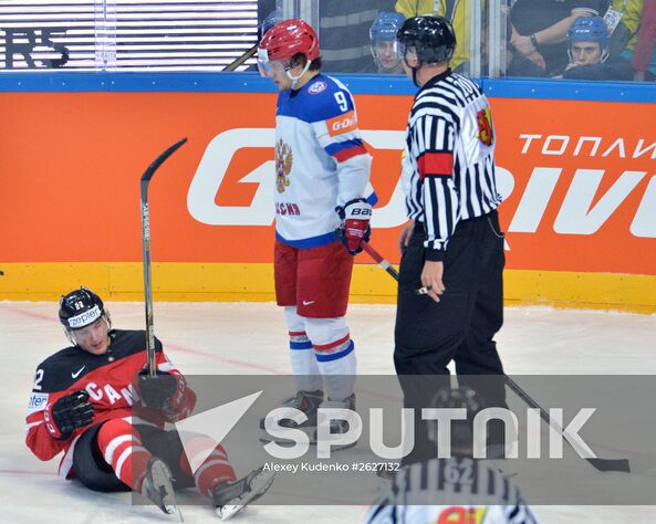 Canadian player Tyson Barrie, left, and Russia's Artemy Panarin during the final match of the 2015 IIHF World Championship, Canada vs. Russia. Location: Czech Republic, Prague. Author: Alexey Kudenko/Sputnik. 2015 IIHF World Championship. Finals. Canada vs. Russia