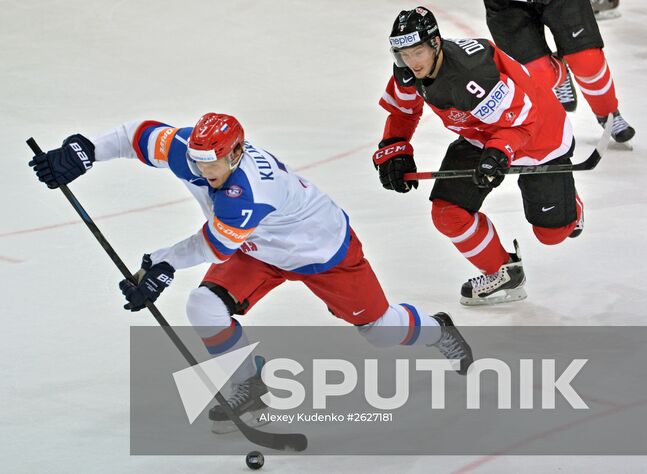Russian player Dmitry Kulikov, left, and Canada's Matt Duchene during the final match of the 2015 IIHF World Championship, Canada vs. Russia. Location: Czech Republic, Prague. Author: Alexey Kudenko/Sputnik. 2015 IIHF World Championship. Finals. Canada vs. Russia