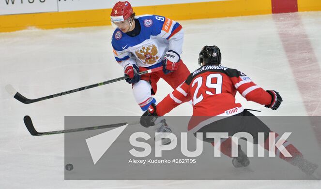 Russian player Artemy Panarin, left, and Canada's Nathan MacKinnon
during the final match of the 2015 IIHF World Championship, Canada vs. Russia. Location: Czech Republic, Prague. Author: Alexey Kudenko/Sputnik. 2015 IIHF World Championship. Finals. Canada vs. Russia