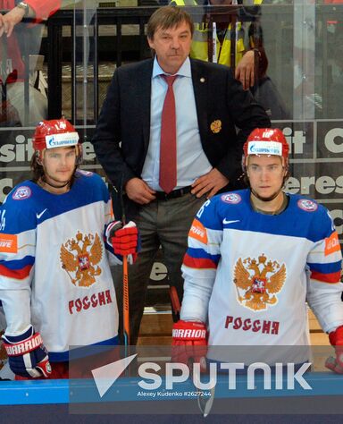 From left: Russian team's player Viktor Tikhonov, head coach Oleg Znarok and player Sergei Plotnikov during the finals between the national teams of Canada and Russia at the 2015 IIHF Ice Hockey World Championship. Location: Czech Republic, Prague. Author: Alexey Kudenko/Sputnik. 2015 IIHF Ice Hockey World Championship. Finals. Canada vs. Russia