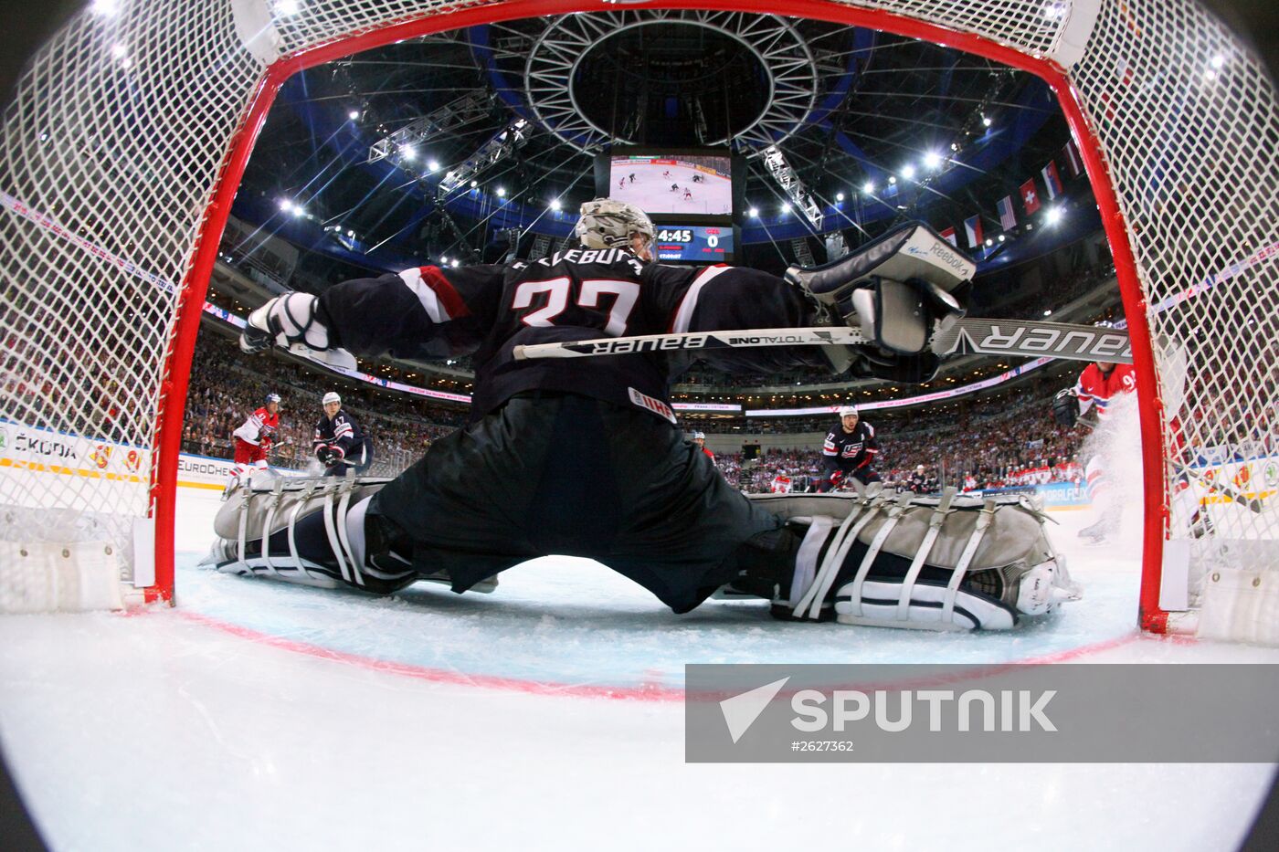 From left: Czech Republic's goalie Ondřej Pavelec and player Jakub Klepiš and US's player Nick Bonino during the bronze medal match between