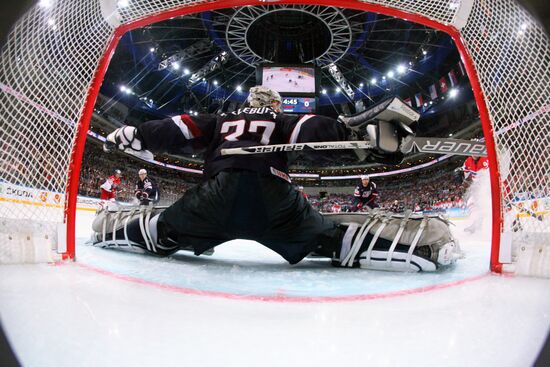 From left: Czech Republic's goalie Ondřej Pavelec and player Jakub Klepiš and US's player Nick Bonino during the bronze medal match between