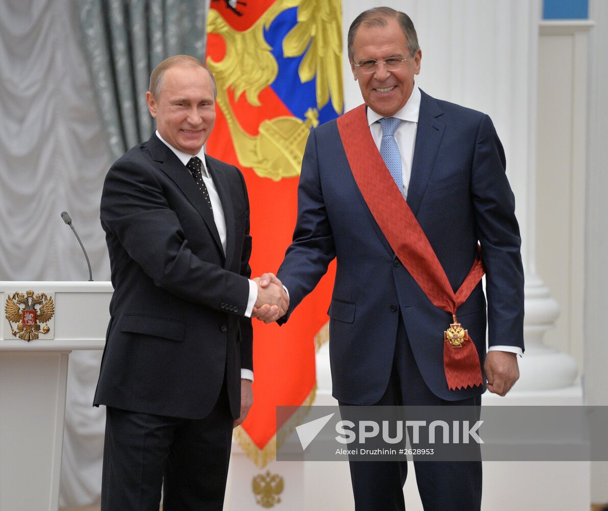 Russian President Vladimir Putin presents state awards in the Kremlin
