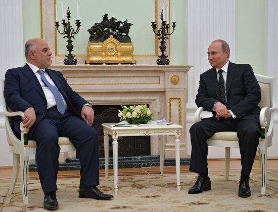 Russian President Vladimir Putin meets with Iraqi prime Minister Haider Al-Abadi
