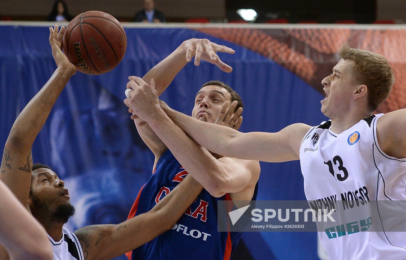 From left: Nizhny Novgorod's Trey Thompkins, CSKA's Aleksandr Kaun and Dmitry Khvostov of BC Nizhny Novgorod during the VTB United League semifinal between PBC CSKA Moscow and BC Nizhny Novgorod. Location: Russia, Moscow. Author: Alexey Filippov/Sputnik. Basketball. VTB United League. CSKA vs. Nizhny Novgorod