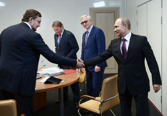 Russian President Vladimir Putin attends Delovaya Rossiya business forum