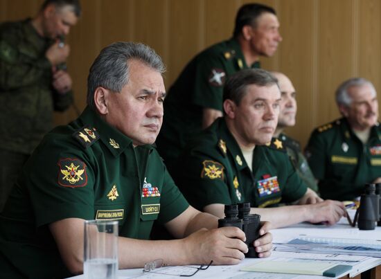 Defense Minister Sergei Shoigu arrives for drill in Ashuluk testing grounds in Astrakhan Region