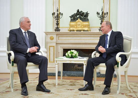 Russian President Vladimir Putin meets with South Ossetian President Leonid Tibilov
