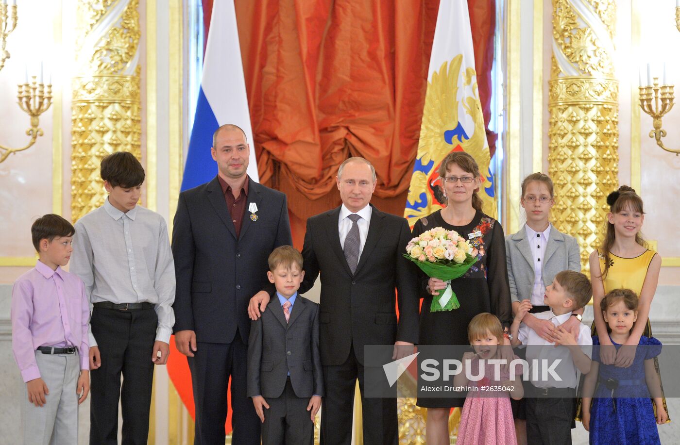 Russian President V.Putin presents Orders of Parental Glory to parents of large families