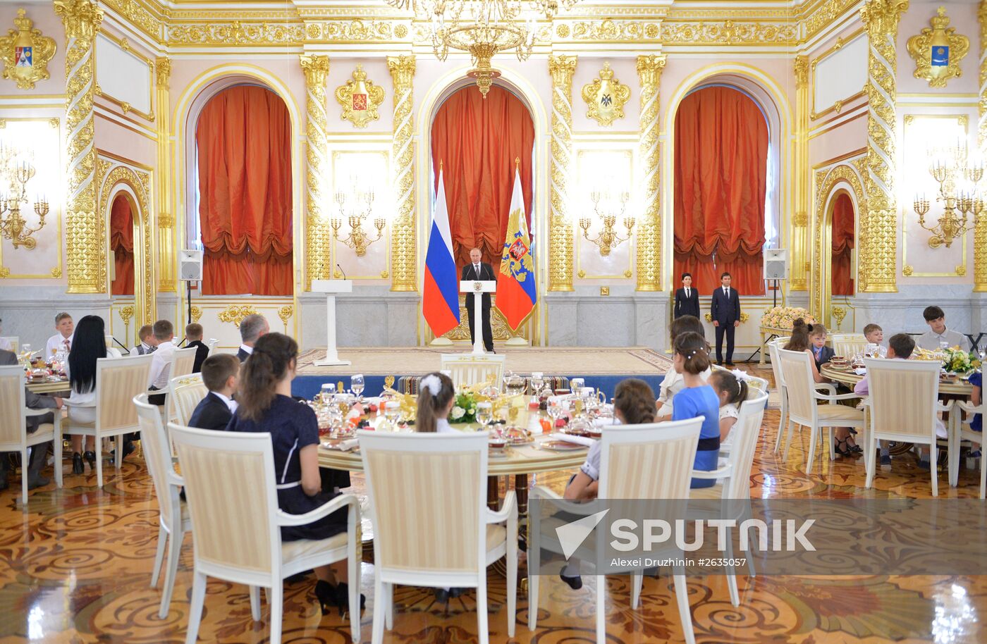 Russian President V.Putin presents Orders of Parental Glory to parents of large families