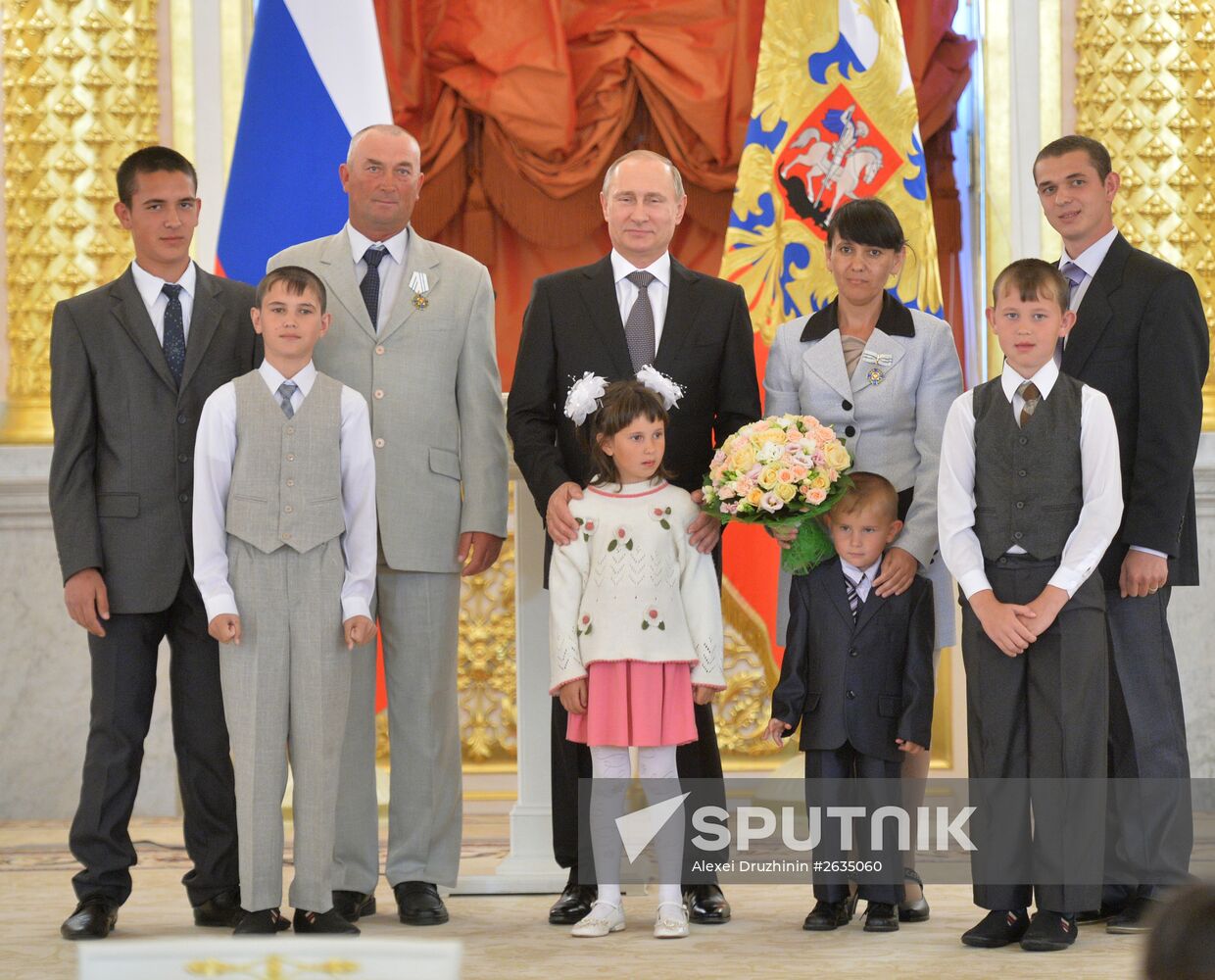 Russian President V.Putin presents Orders of Parental Glory to parents of large families