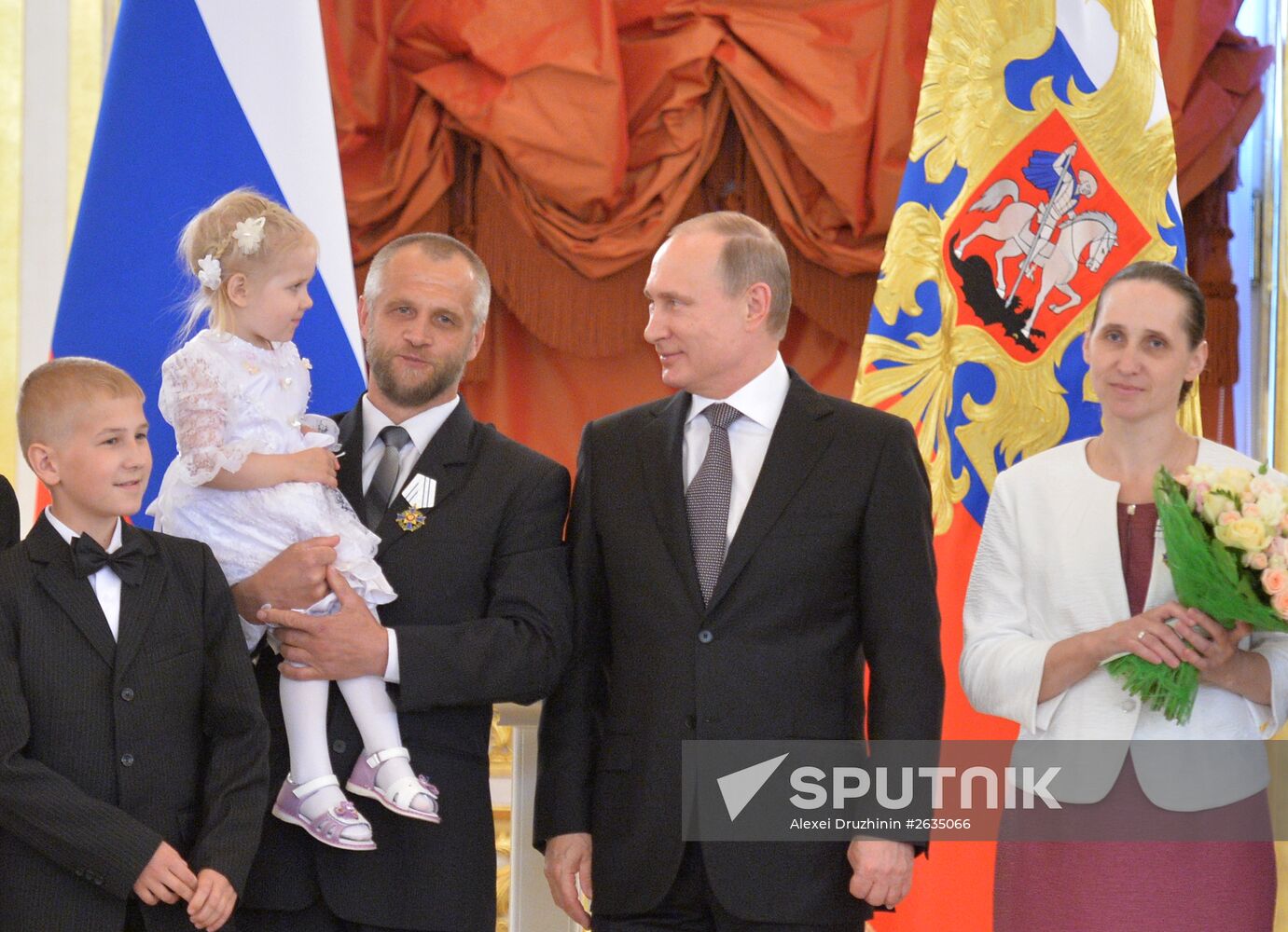 Russian President V.Putin presents Orders of Parental Glory to parents of large families