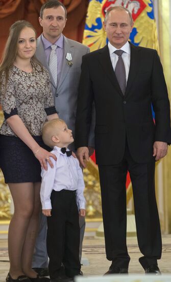 Russian President V.Putin presents Orders of Parental Glory to parents of large families