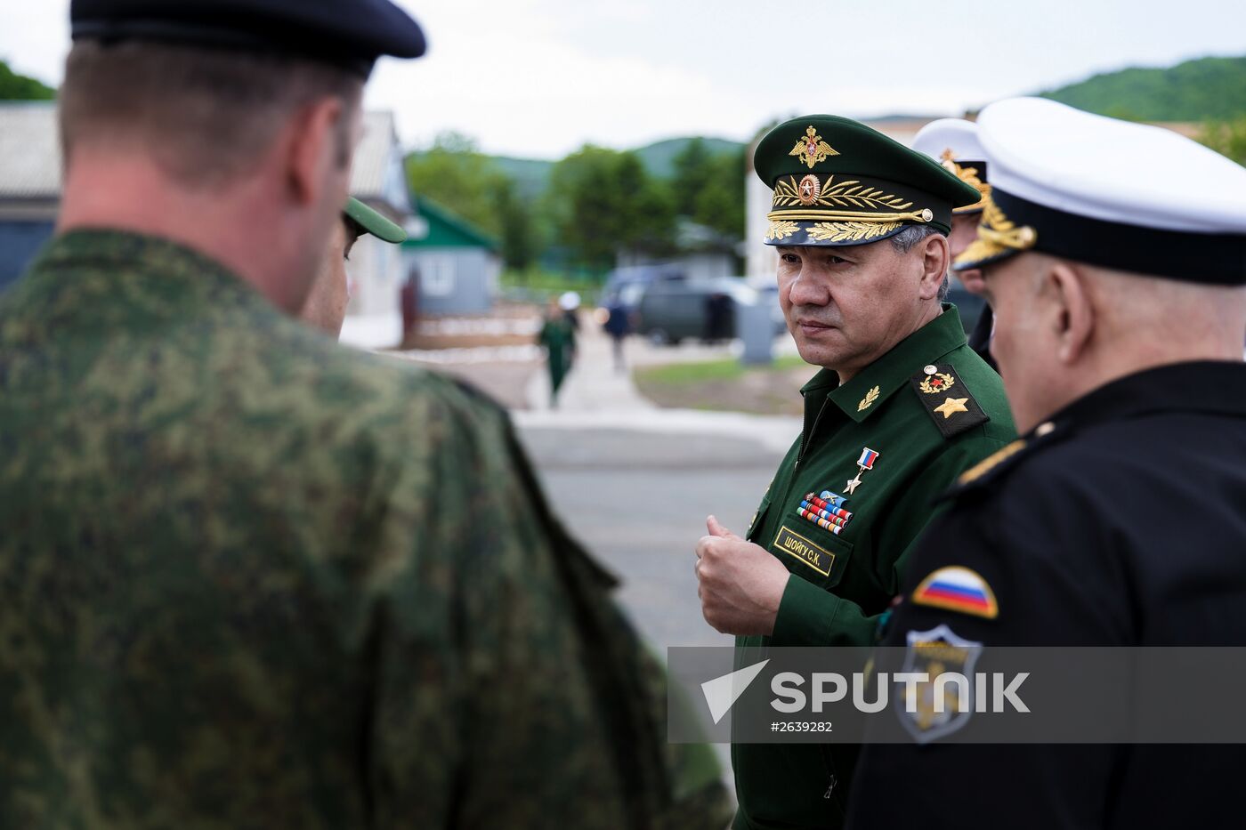 Defense Minister Sergei Shoigu inspects new weapons of marine task force in Far East