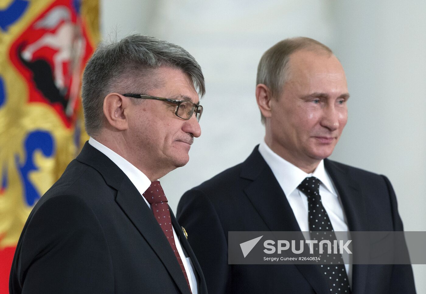 June 12, 2015. Russian President Vladimir Putin and film director Alexander Sokurov at the ceremony of the 2014 National Awards for science and technology, literature and the arts in the Grand Kremlin Palace. Location: Russia, Moscow. Author: Sergey Guneev/Sputnik. National awards presented on Russia Day in Kremlin