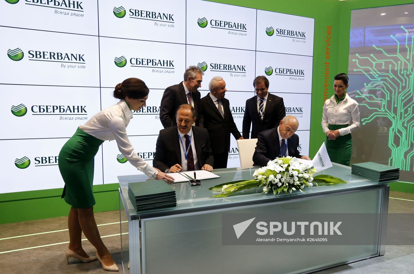 The signing of agreements between Sberbank and Istanbul Airport at the 2015 St. Petersburg International Economic Forum. Location: Russia, St. Petersburg. Author: Alexandr Demyanchuk/Sputnik. 2015 St. Petersburg International Economic Forum (SPIEF). Day One