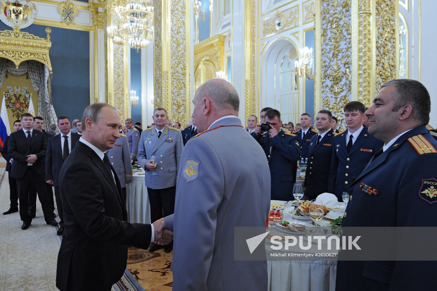 Russian President Vladimir Putin hosts reception in honor of military academy graduates