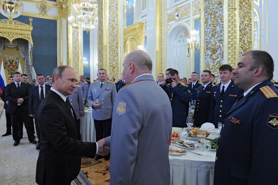 Russian President Vladimir Putin hosts reception in honor of military academy graduates