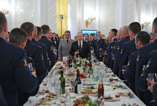 Russian President Vladimir Putin hosts reception in honor of military academy graduates