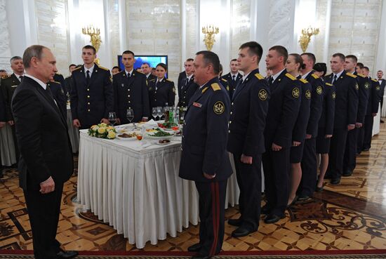 Russian President Vladimir Putin hosts reception in honor of military academy graduates