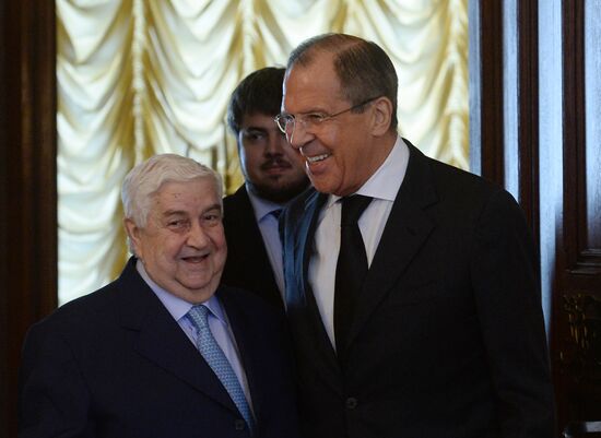 Russian Foreign Minister Sergei Lavrov meets with his Syrian counterpart Walid Muallem