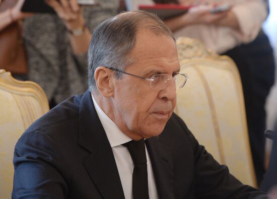 Russian Foreign Minister Sergei Lavrov meets with his Syrian counterpart Walid Muallem