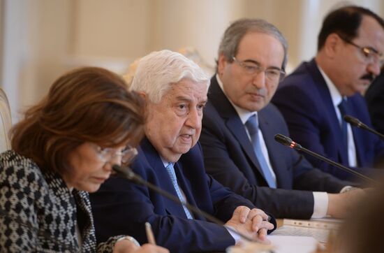 Russian Foreign Minister Sergei Lavrov meets with his Syrian counterpart Walid Muallem