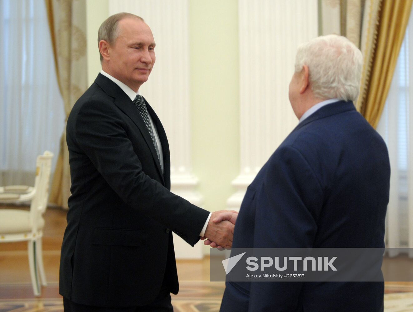 Russian President Vladimir Putin meets with Syrian Foreign Minister Walid Muallem