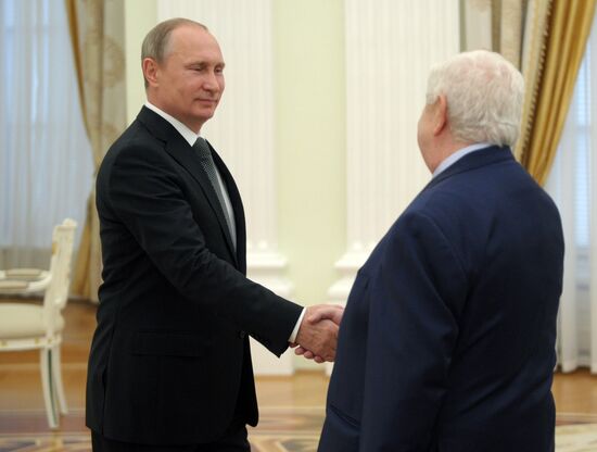 Russian President Vladimir Putin meets with Syrian Foreign Minister Walid Muallem
