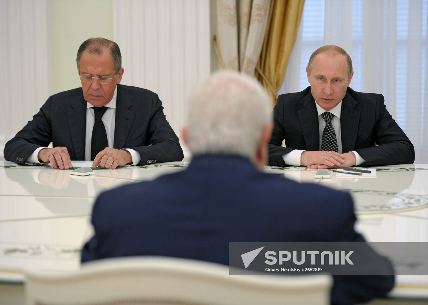 Russian President Vladimir Putin meets with Syrian Foreign Minister Walid Muallem